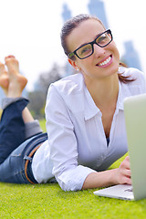 Image showing woman with laptop in park