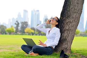 Image showing woman with laptop in park