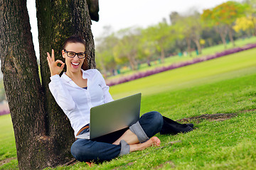 Image showing woman with laptop in park