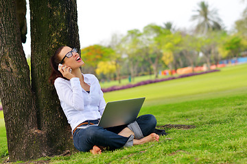 Image showing woman with laptop in park