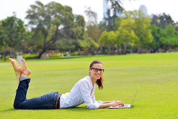 Image showing woman with laptop in park