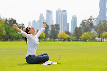 Image showing woman with laptop in park