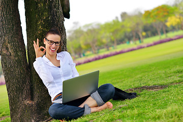 Image showing woman with laptop in park