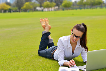 Image showing woman with laptop in park