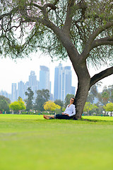 Image showing woman with laptop in park