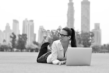 Image showing woman with laptop in park