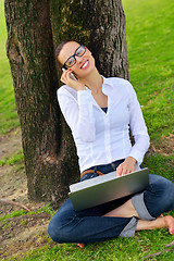 Image showing woman with laptop in park