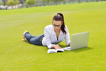 Image showing woman with laptop in park