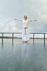 Image showing young woman relax on cloudy summer day