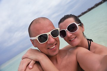 Image showing happy young  couple at summer vacation have fun and relax at bea