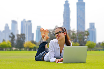 Image showing woman with laptop in park