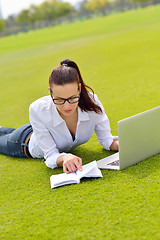 Image showing woman with laptop in park