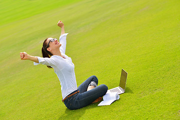 Image showing woman with laptop in park