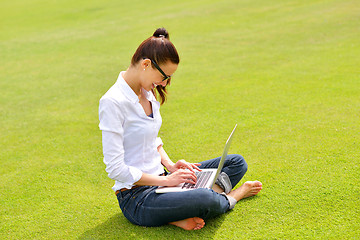 Image showing woman with laptop in park