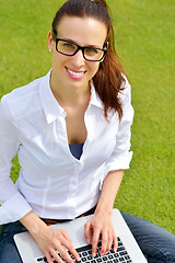 Image showing woman with laptop in park