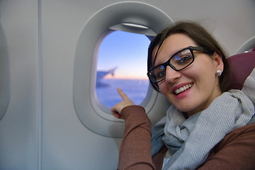 Image showing woman in airplane travel