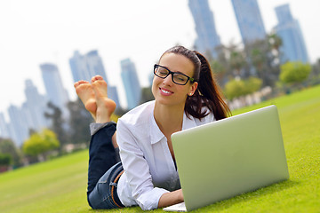 Image showing woman with laptop in park