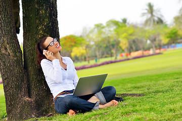 Image showing woman with laptop in park