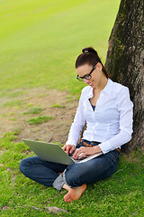 Image showing woman with laptop in park