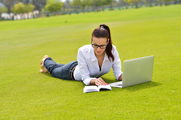 Image showing woman with laptop in park