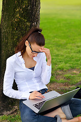 Image showing woman with laptop in park