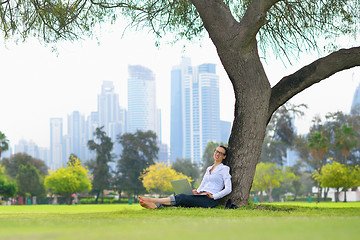 Image showing woman with laptop in park