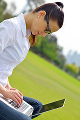 Image showing woman with laptop in park