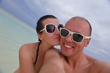 Image showing happy young  couple at summer vacation have fun and relax at bea