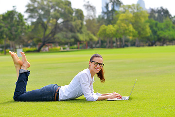 Image showing woman with laptop in park