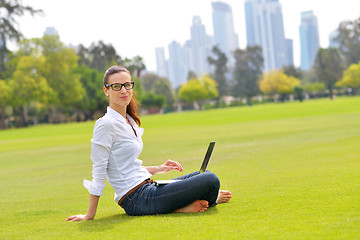 Image showing woman with laptop in park