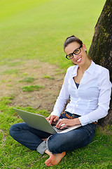 Image showing woman with laptop in park