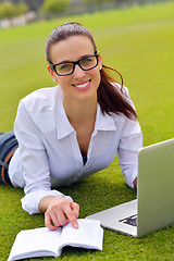 Image showing woman with laptop in park