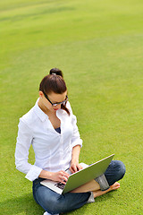 Image showing woman with laptop in park