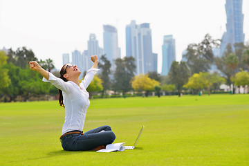 Image showing woman with laptop in park