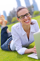 Image showing woman with laptop in park