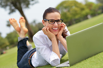 Image showing woman with laptop in park