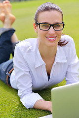 Image showing woman with laptop in park