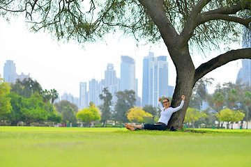 Image showing woman with laptop in park