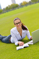 Image showing woman with laptop in park