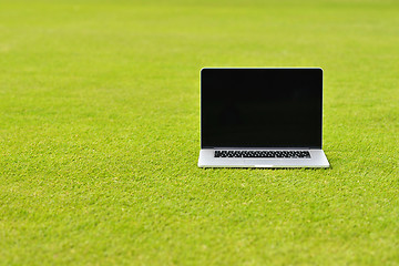 Image showing laptop computer  on grass