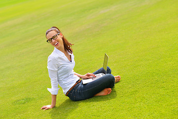 Image showing woman with laptop in park