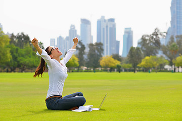 Image showing woman with laptop in park