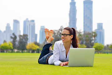 Image showing woman with laptop in park