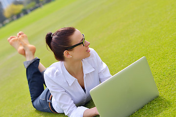 Image showing woman with laptop in park