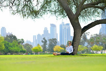 Image showing woman with laptop in park