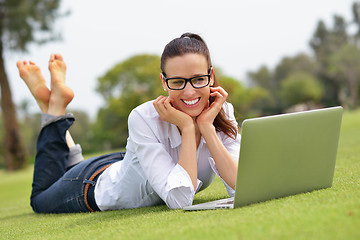 Image showing woman with laptop in park