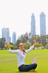 Image showing woman with laptop in park