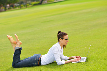 Image showing woman with laptop in park