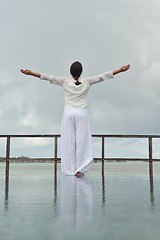 Image showing young woman relax on cloudy summer day