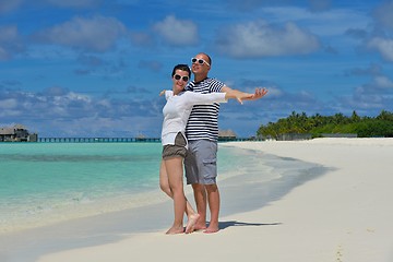 Image showing happy young  couple at summer vacation have fun and relax at bea